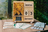 Ewiger Kalender Vier Jahreszeiten aus Holz - Geschenk plus Baumspende in deutschem Landesforst