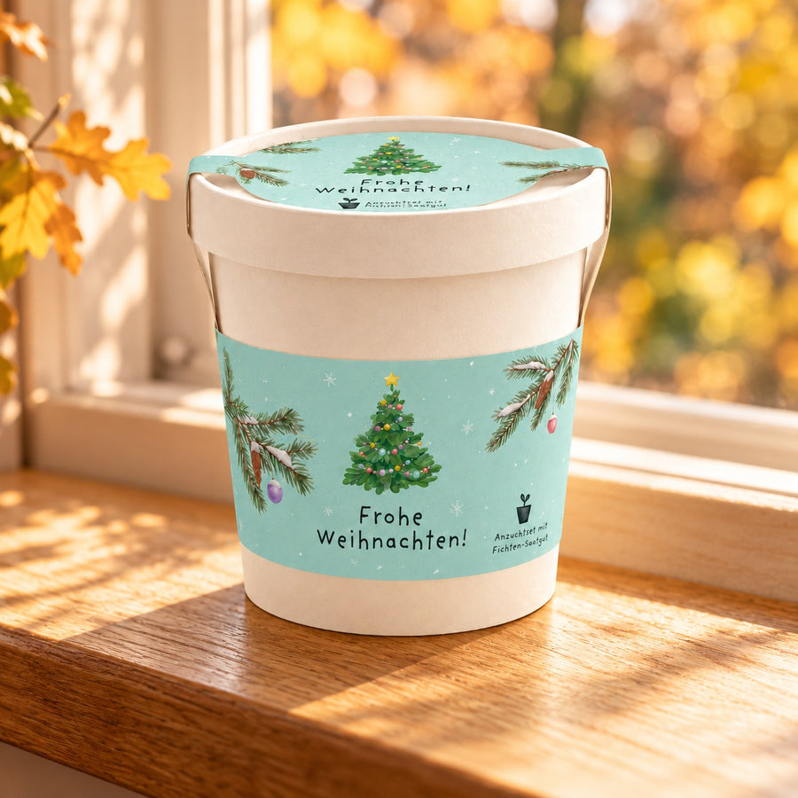 Frohe Weihnachten im Becher im herbstlichen Setting – Produkt ohne Baumpflanzung